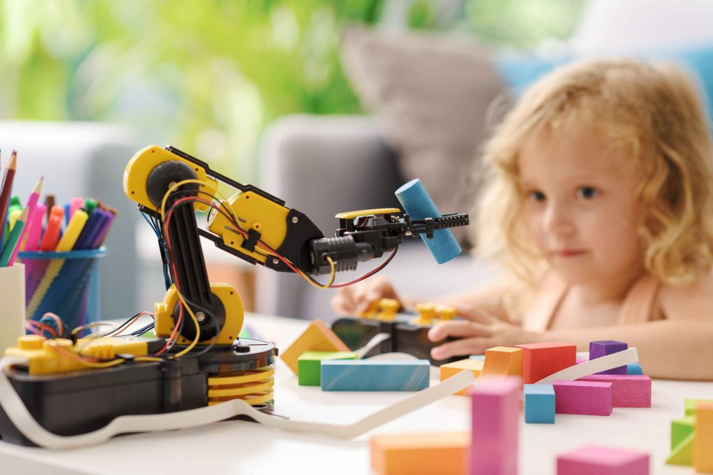 7018child-playing-with-a-robotic-arm-toy-2023-01-31-23-21-35-utc-1024x683.jpg